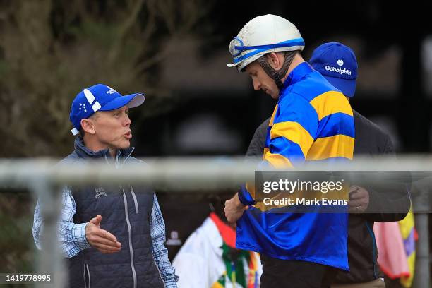 Chris Munce talks to Hugh Bowman after Palaisipan trialled in heat 3 during Canterbury Barrier Trials on September 01, 2022 in Sydney, Australia.
