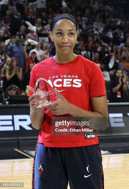 Ja Wilson of the Las Vegas Aces is presented with the 2022 WNBA Defensive Player of the Year award before Game Two of the 2022 WNBA Playoffs...