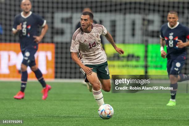 Luis Chávez of Mexico during a game between Paraguay and Mexico at Mercedes-Benz Stadium on August 31, 2022 in Atlanta, Georgia.