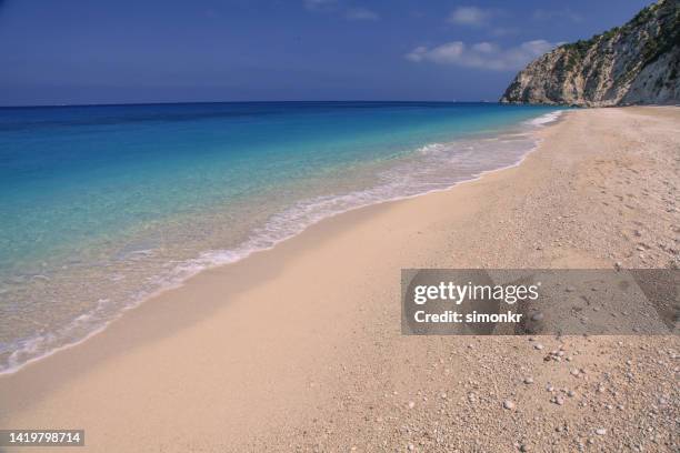 view of sandy egremni beach - egremni stock pictures, royalty-free photos & images