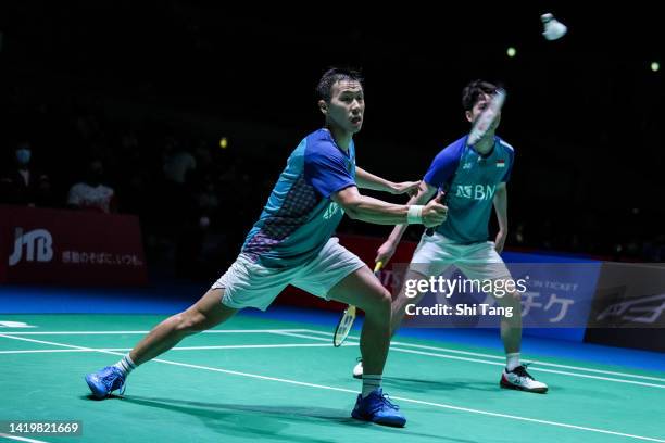 Marcus Fernaldi Gideon and Kevin Sanjaya Sukamuljo of Indonesia compete in the Men's Doubles Second Round match against Kim Gi Jung and Kim Sa Rang...