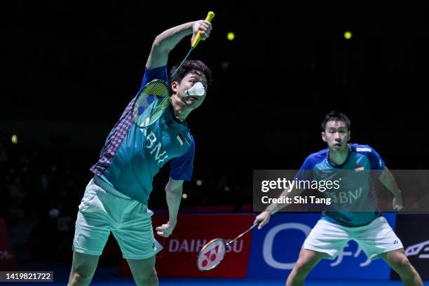 Marcus Fernaldi Gideon and Kevin Sanjaya Sukamuljo of Indonesia compete in the Men's Doubles Second Round match against Kim Gi Jung and Kim Sa Rang...