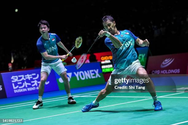 Marcus Fernaldi Gideon and Kevin Sanjaya Sukamuljo of Indonesia compete in the Men's Doubles Second Round match against Kim Gi Jung and Kim Sa Rang...