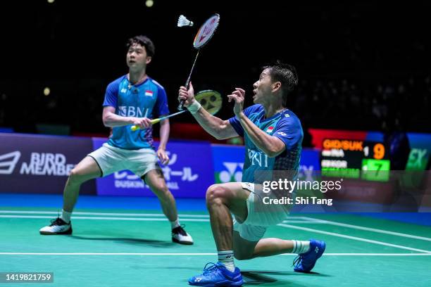 Marcus Fernaldi Gideon and Kevin Sanjaya Sukamuljo of Indonesia compete in the Men's Doubles Second Round match against Kim Gi Jung and Kim Sa Rang...