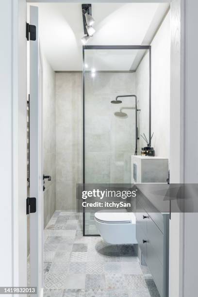 modern bathroom with shower and toilet - bathroom door imagens e fotografias de stock