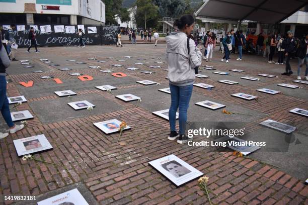 Photos of victims of enforced disappearances are seen with the word phrase "Never Forgotten" during the framework of the International Day of the...