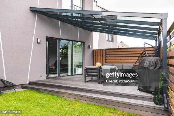 outdoor seating area by the private house - patio doors bildbanksfoton och bilder