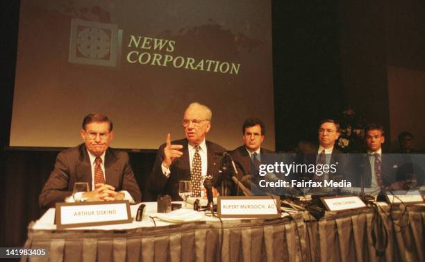 Rupert Murdoch at the News Corporation AGM in Adelaide. Lachlan Murdoch is seated on the right and News Corp legal council, Arthur Siskind, is seated...