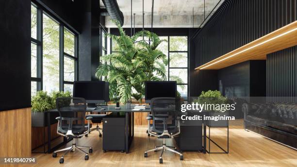 sustainable green open plan office space - dark office stock pictures, royalty-free photos & images