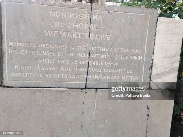Statue made in memory of those who died, the plaque reads No More Hiroshima, No More Bhopal. The wrecked insecticide manufacturing factory of Union...