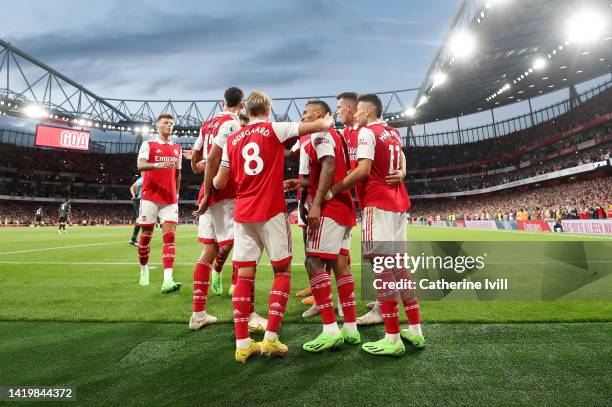 Gabriel Jesus of Arsenal celebrates with his team mates after scoring the first goal during the Premier League match between Arsenal FC and Aston...