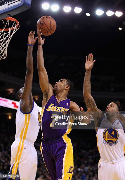 Ramon Sessions of the Los Angeles Lakers drives to the basket during their game against the Golden State Warriors at Oracle Arena on March 27, 2012...