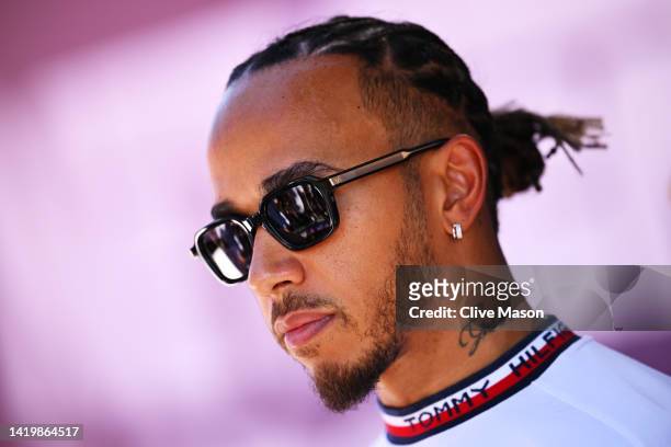 Lewis Hamilton of Great Britain and Mercedes looks on in the Paddock during previews ahead of the F1 Grand Prix of The Netherlands at Circuit...