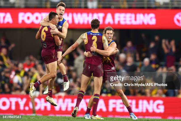 Lions celebrate winning the AFL Second Elimination Final match between the Brisbane Lions and the Richmond Tigers at The Gabba on September 01, 2022...
