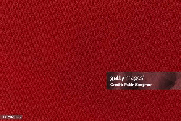 dark red color fabric cloth polyester texture and textile background. - carbon fiber texture stockfoto's en -beelden