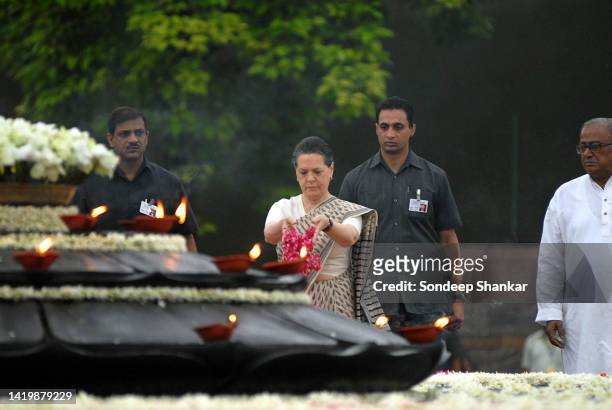 Sonia Gandhi offers rose petals at the memorial of the former Prime Minister and her husband Rajiv Gandhi to mark his death anniversary at Shakti...