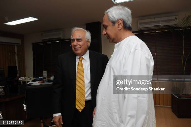 Union Law Minister Kapil Sibal met Chief Minister Naveen Patnaik in New Delhi on recommendation for setting up permanent benches of Odisha High Court...