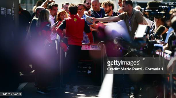 Charles Leclerc of Monaco and Ferrari talks to the media in the Paddock during previews ahead of the F1 Grand Prix of The Netherlands at Circuit...