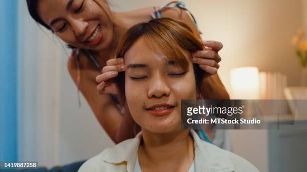 blod patient Fiasko Young Asian Female Lesbian In Living Room Happy Girls Relaxing Girlfriends  Taking Care Massage On Shoulder Sit On Cozy Sofa Couch At Night High-Res  Stock Photo - Getty Images