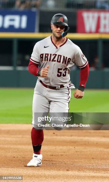 Christian Walker of the Arizona Diamondbacks runs to third base in the second inning against the Chicago White Sox at Guaranteed Rate Field on August...