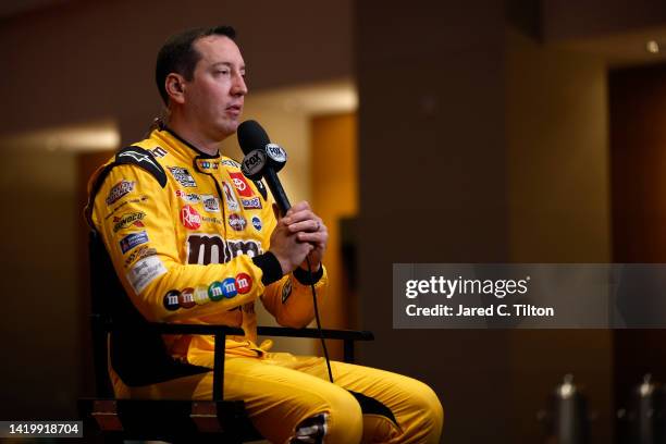 Driver Kyle Busch speaks with the media during the NASCAR Cup Series Playoff Media Day at Charlotte Convention Center on September 01, 2022 in...