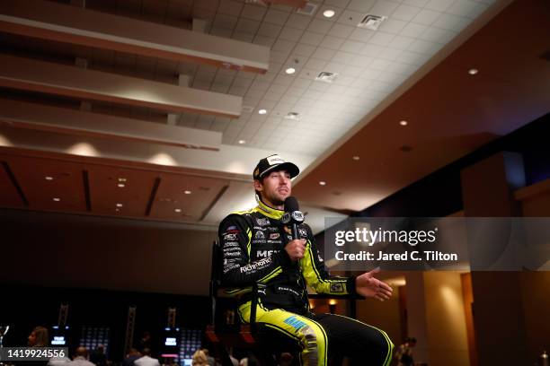 Driver Ryan Blaney speaks with the media during the NASCAR Cup Series Playoff Media Day at Charlotte Convention Center on September 01, 2022 in...