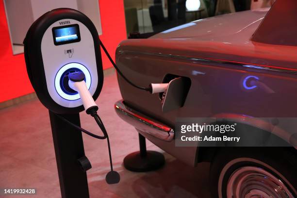Vestel electric car charger charges a electric modified vintage Rolls-Royce automobile during a press preview at the IFA 2022 consumer electronics...