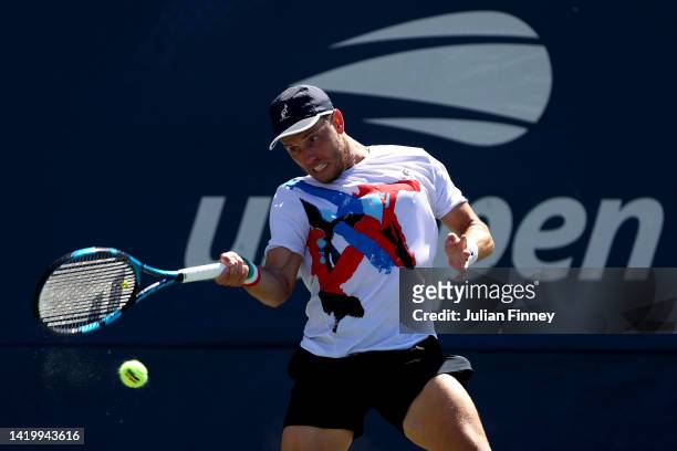 James Duckworth of Australia returns a shot against Daniel Evans of Great Britain during their Men's Singles Second Round match on Day Four of the...