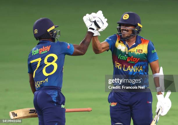 Asitha Fernando of Sri Lanka and Maheesh Theekshana of Sri Lanka celebrates victory after winning the DP World T20 match between Sri Lanka and...