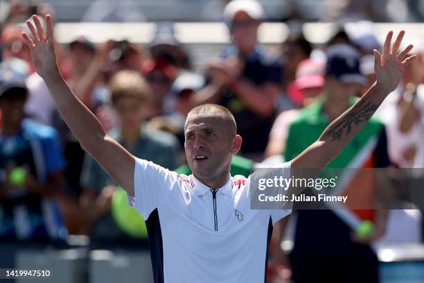 Daniel Evans of Great Britain celebrates after defeating James Duckworth of Australia during their Men's Singles Second Round match on Day Four of...