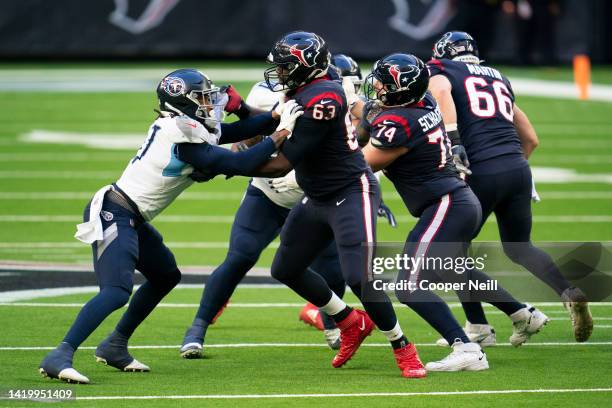 Roderick Johnson of the Houston Texans and offensive tackle Max Scharping protect the pocket during an NFL game against the Tennessee Titans on...