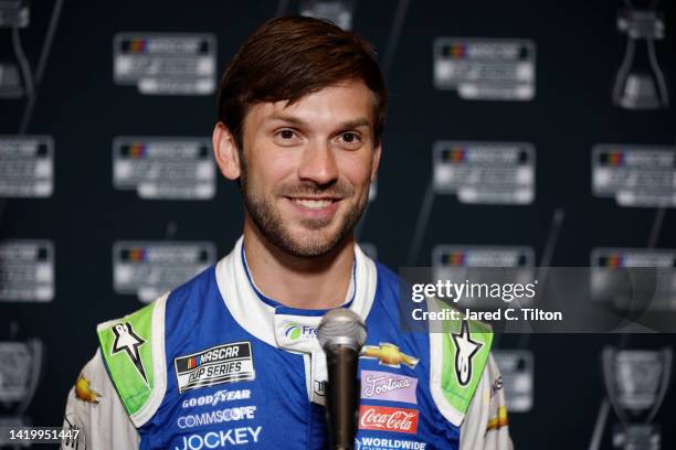 Driver Daniel Suarez speaks with the media during the NASCAR Cup Series Playoff Media Day at Charlotte Convention Center on September 01, 2022 in...