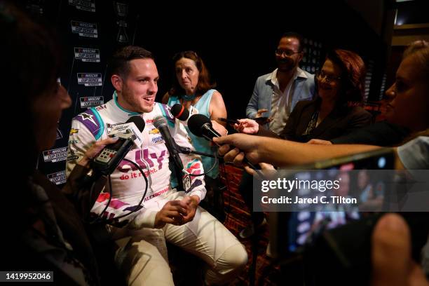 Driver Alex Bowman speaks with the media during the NASCAR Cup Series Playoff Media Day at Charlotte Convention Center on September 01, 2022 in...