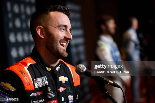 Driver Austin Dillon speaks with the media during the NASCAR Cup Series Playoff Media Day at Charlotte Convention Center on September 01, 2022 in...