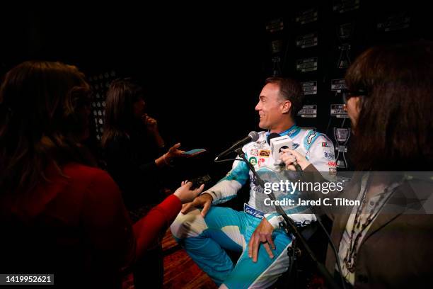 Driver Kevin Harvick speaks with the media during the NASCAR Cup Series Playoff Media Day at Charlotte Convention Center on September 01, 2022 in...