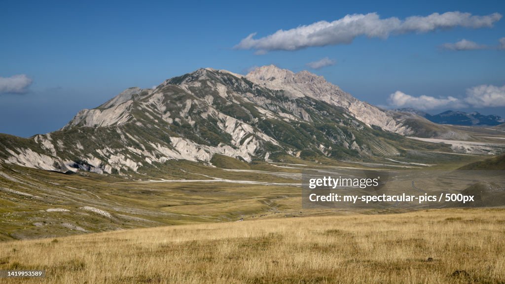 Scenic view of snowcapped mountains against sky,Italy