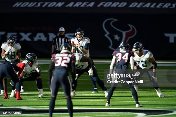 Ryan Tannehill of the Tennessee Titans gets set on the line of scrimmage during an NFL game against the Houston Texans on January 03, 2021 in...
