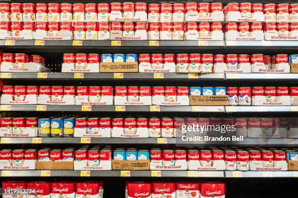 Campbell's soup is seen on shelves at a Walmart store on September 01, 2022 in Houston, Texas. Campbell's experienced a drop in profit of $96 million...