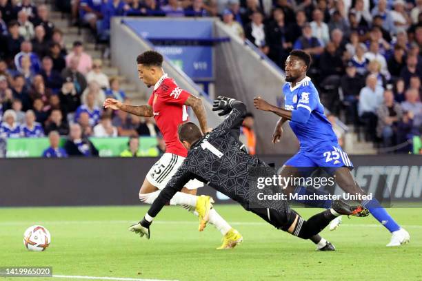 Jadon Sancho of Manchester United scores their side's first goal during the Premier League match between Leicester City and Manchester United at The...