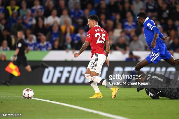 Jadon Sancho of Manchester United scores their side's first goal during the Premier League match between Leicester City and Manchester United at The...