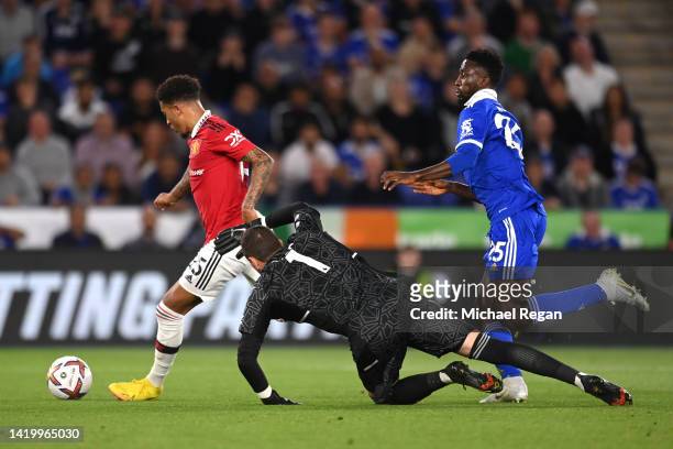 Jadon Sancho of Manchester United scores their side's first goal during the Premier League match between Leicester City and Manchester United at The...