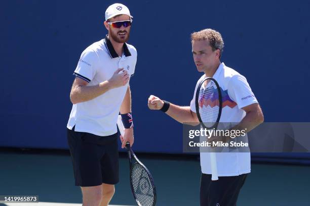 Jamie Murray of Great Britain and Bruno Soares of Brazil react to a point against Hunter Reese of the United States and Max Schnur of the United...