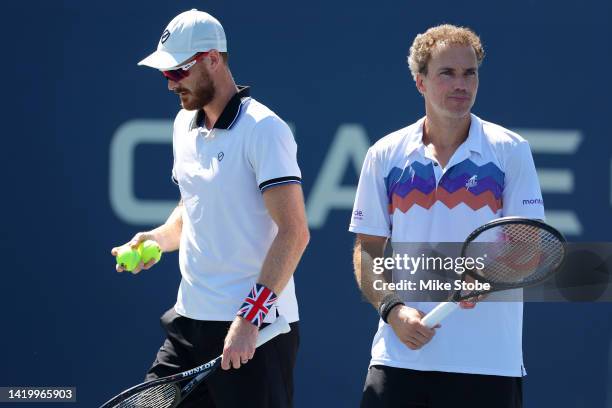 Jamie Murray of Great Britain and Bruno Soares of Brazil look on against Hunter Reese of the United States and Max Schnur of the United States during...