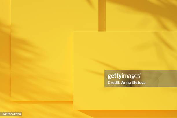 yellow bright podiums with shadows in flat lay style. perfect place for your products presentation. - flat lay photography stock-fotos und bilder