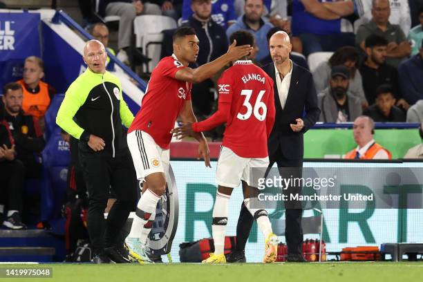 Casemiro of Manchester United comes on to replace Anthony Elanga of Manchester United during the Premier League match between Leicester City and...