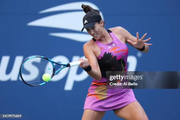 Garbine Muguruza of Spain plays a forehand against Linda Fruhvirtova of Czech Republic during their Women's Singles Second Round match on Day Four of...