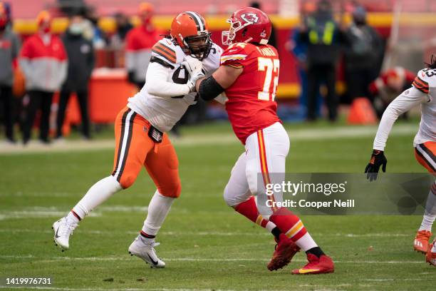 Adrian Clayborn of the Cleveland Browns battles with Eric Fisher of the Kansas City Chiefs during an NFL divisional round playoff football game on...