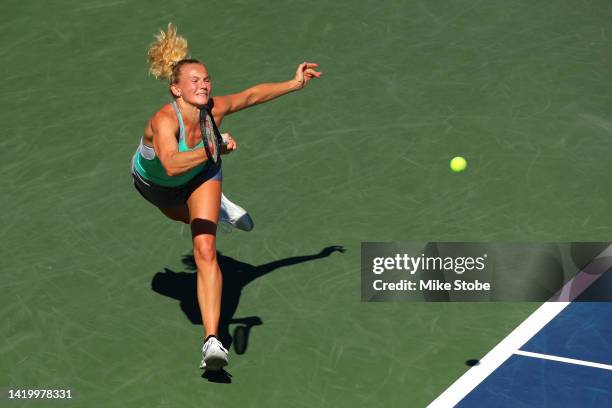 Katerina Siniakova of Czech Republic returns a shot against Alize Cornet of France during their Women's Singles Second Round match on Day Four of the...