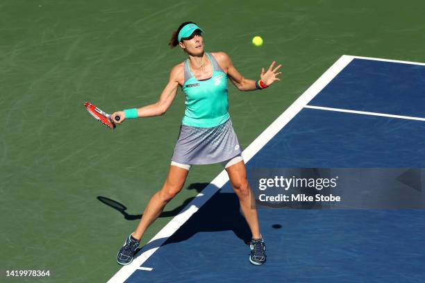 Alize Cornet of France returns a shot against Katerina Siniakova of Czech Republic during their Women's Singles Second Round match on Day Four of the...