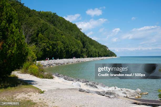 scenic view of sea against sky,mackinac island,michigan,united states,usa - mackinac island stock pictures, royalty-free photos & images